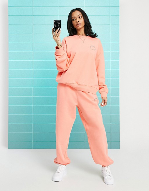 ASOS Weekend Collective co-ord oversized sweatshirt with tonal embroidery logo in coral | ASOS